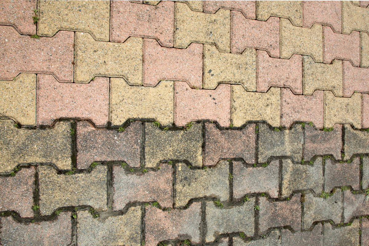 Powerwashing before-after on ground bricks