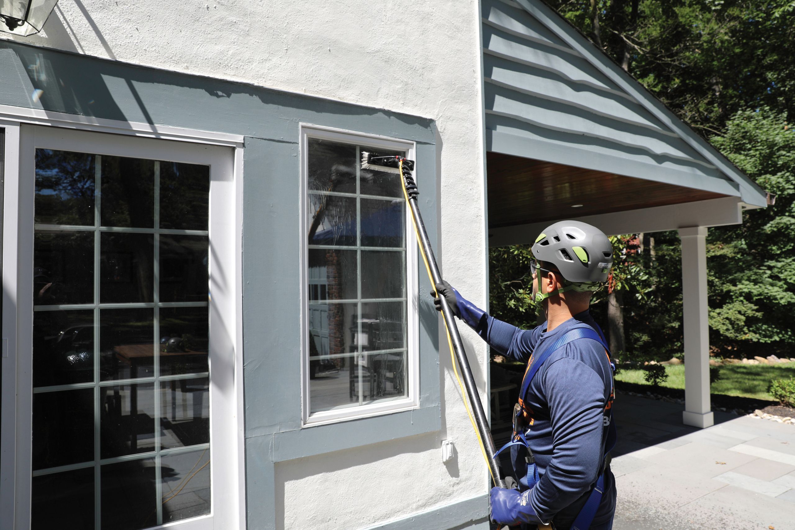 Man cleaning a window