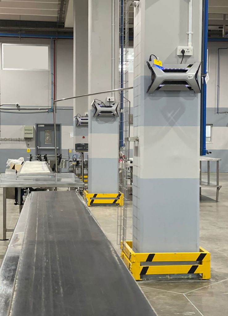 Industrial workspace with equipment and lighting