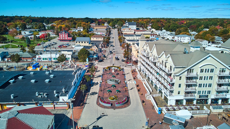 Aerial photo of downtown main street lined with shops.