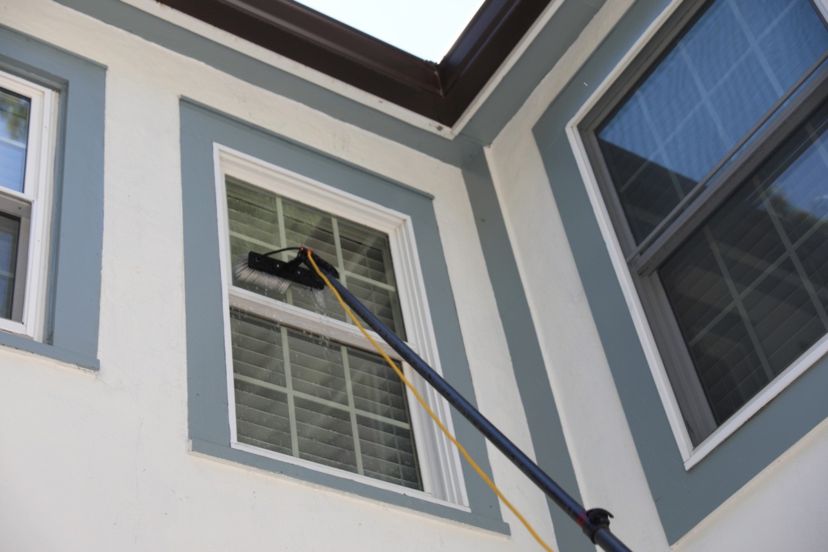 window cleaning on the 2nd floor of a home